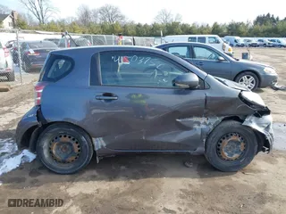 2013 Scion iQ with VIN JTNJJXB00DJ025113, listed as a IAAI auction lot 41503756 with 105,557 mi miles. Bid and sale history available at carsss.com. Image 12.