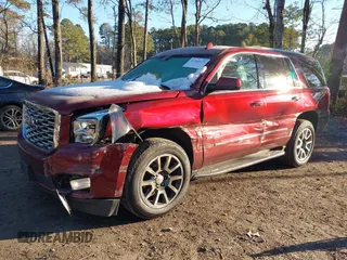 2019 GMC Yukon Denali with VIN 1GKS2CKJ8KR137636, listed as a IAAI auction lot 41264171 with 153,136 mi miles. Bid and sale history available at carsss.com. Image 2.
