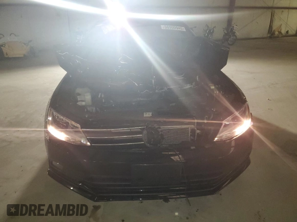 2015 Volkswagen Jetta SE with VIN 3VWD17AJ0FM211443, listed as a Copart auction lot 56900945 with 68,581 mi miles and Salvage title. Bid and sale history available at DreamBid. Image 5.