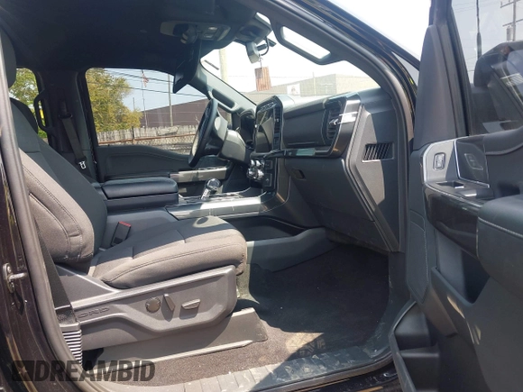 2023 Ford F-150 XL z VIN 1FTEW1EP6PKF23103, wystawiony jako IAAI lot #42390868 z przebiegiem 15 149 mil mil oraz . Historia ofert i sprzedaży dostępna na DreamBid. Obrazek 5.