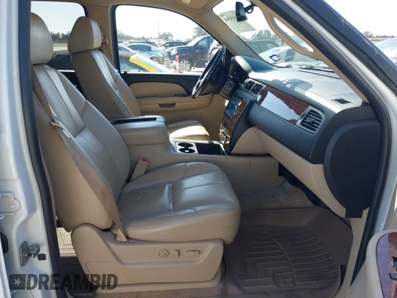 2007 Chevrolet Tahoe LTZ with VIN 1GNFC13027J402178, listed as a IAAI auction lot 41605898 with 203,677 mi miles and . Bid and sale history available at DreamBid. Image 5.