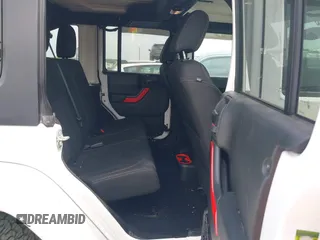 2018 Jeep Wrangler Unlimited Sahara with VIN 1C4HJWEG1JL801934, listed as a IAAI auction lot 42072968 with 112,432 mi miles and . Bid and sale history available at DreamBid. Image 8.