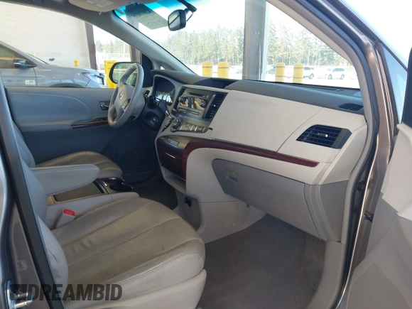 2011 Toyota Sienna XLE AAS with VIN 5TDYK3DC7BS047822, listed as a IAAI auction lot 42073635 with 150,424 mi miles. Bid and sale history available at carsss.com. Image 5.