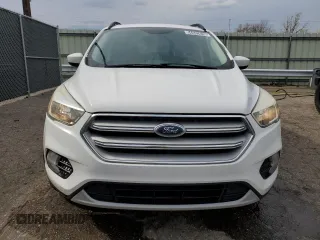 2018 Ford Escape SE with VIN 1FMCU9GD5JUA41244, listed as a Copart auction lot 54447615 with 128,542 mi miles and Clean Title. Bid and sale history available at carsss.com. Image 5.