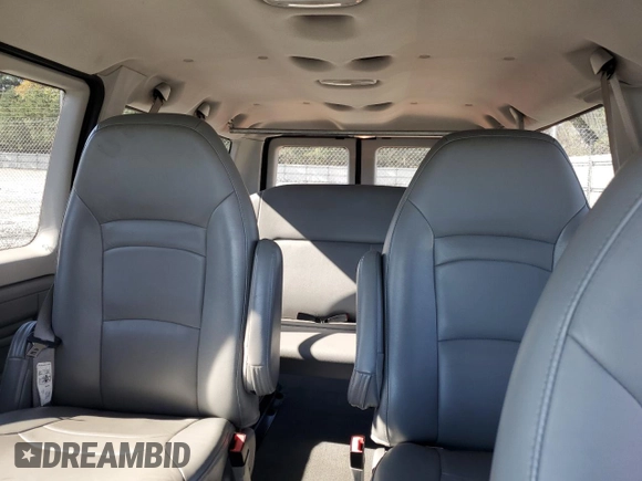 2008 Ford Econoline Passenger XL with VIN 1FMNE11L48DA51670, listed as a Copart auction lot 77653154 with 124,127 mi miles and Salvage title. Bid and sale history available at DreamBid. Image 10.
