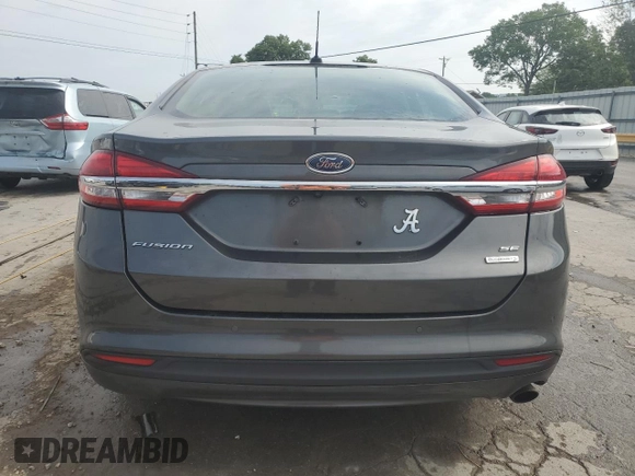 2018 Ford Fusion SE с VIN 3FA6P0HD3JR231639, выставлен на аукционе Copart как лот 59798395 с пробегом 121 368 миль миль и Списание • Salvage title. История ставок и продаж доступна на DreamBid. Изображение 6.