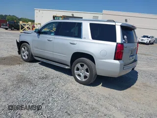 2015 Chevrolet Tahoe LTZ z VIN 1GNSCCKC8FR149888, wystawiony jako IAAI lot #42049804 z przebiegiem 182 991 mil mil oraz . Historia ofert i sprzedaży dostępna na DreamBid. Obrazek 3.