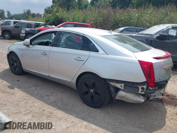 2014 Cadillac XTS Luxury z VIN 2G61N5S38E9270619, wystawiony jako IAAI lot #40140617 z przebiegiem 117 286 mil mil oraz . Historia ofert i sprzedaży dostępna na DreamBid. Obrazek 3.