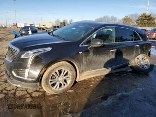 2021 Cadillac XT5 AWD Premium Luxury with VIN 1GYKNDRS6MZ111640, listed as a Copart auction lot 46567035 with 57,484 mi miles and Salvage Title. Bid and sale history available at carsss.com. Image 1.