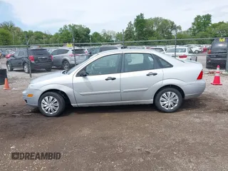 2007 Ford Focus S with VIN 1FAFP34N07W141693, listed as a IAAI auction lot 42310938 with 150,489 mi miles and . Bid and sale history available at DreamBid. Image 14.