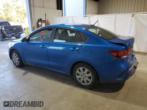 2021 Kia Rio S with VIN 3KPA24ADXME422202, listed as a Copart auction lot 85538434 with 99,138 mi miles and Salvage Title. Bid and sale history available at DreamBid. Image 2.