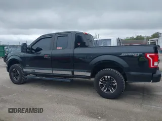2015 Ford F-150 XLT with VIN 1FTEX1EP2FFC73234, listed as a IAAI auction lot 41661655 with 150,371 mi miles. Bid and sale history available at carsss.com. Image 14.