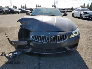 2014 BMW Z4 sDrive35i with VIN WBALM7C50EE385780, listed as a Copart auction lot 74046914 with 88,766 mi miles and Salvage Title. Bid and sale history available at carsss.com. Image 5.