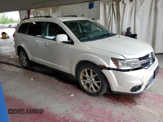 2013 Dodge Journey SXT with VIN 3C4PDDBG1DT521452, listed as a Copart auction lot 62660785 with 177,945 mi miles and Salvage title. Bid and sale history available at DreamBid. Image 4.