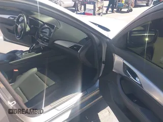 2023 Cadillac CT5 Luxury z VIN 1G6DW5RK3P0106764, wystawiony jako IAAI lot #42491584 z przebiegiem 32 223 mil mil oraz . Historia ofert i sprzedaży dostępna na DreamBid. Obrazek 5.