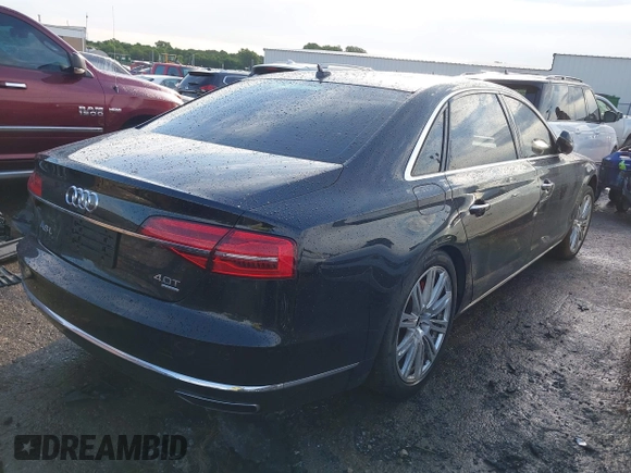 2015 Audi A8 4.0T z VIN WAU32AFD6FN022648, wystawiony jako IAAI lot #42358142 z przebiegiem 103 416 mil mil oraz . Historia ofert i sprzedaży dostępna na DreamBid. Obrazek 4.