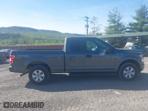 2019 Ford F-150 XL with VIN 1FTEX1EP1KKC64106, listed as a IAAI auction lot 42161813 with 127,387 mi miles. Bid and sale history available at carsss.com. Image 13.