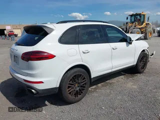2017 Porsche Cayenne with VIN WP1AA2A28HKA87514, listed as a IAAI auction lot 41883554 with 161,593 mi miles and . Bid and sale history available at DreamBid. Image 4.