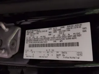 2014 Ford Escape SE with VIN 1FMCU0GX9EUB21853, listed as a IAAI auction lot 40313063 with 106,687 mi miles. Bid and sale history available at carsss.com. Image 9.
