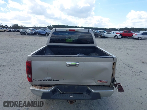 2009 GMC Canyon SLE1 with VIN 1GTCS139998131563, listed as a IAAI auction lot 41561682 with 211,603 mi miles. Bid and sale history available at carsss.com. Image 16.