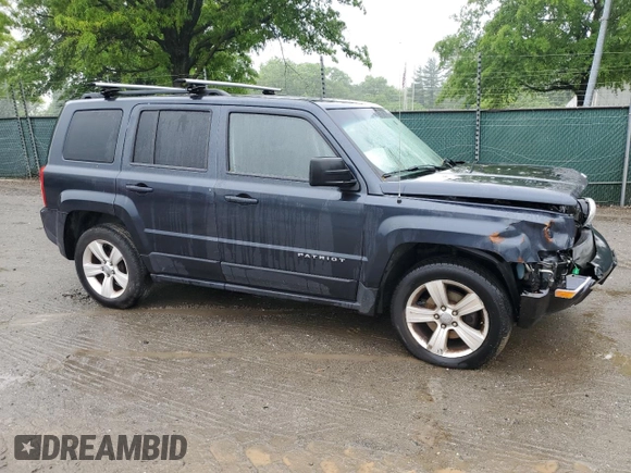 2014 Jeep Patriot Latitude with VIN 1C4NJPFA1ED651021, listed as a Copart auction lot 56947445 with 137,239 mi miles and Salvage title. Bid and sale history available at DreamBid. Image 4.