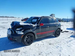 2011 MINI Countryman S with VIN WMWZC5C50BWL55234, listed as a IAAI auction lot 41323339 with 134,709 mi miles and . Bid and sale history available at DreamBid. Image 2.