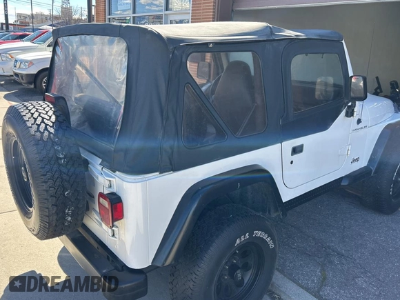 1999 Jeep Wrangler SE with VIN 1J4FY29P0XP413546, listed as a Copart auction lot 50640345 with 79,759 mi miles and Clean Title. Bid and sale history available at carsss.com. Image 4.
