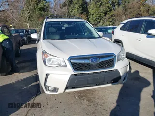 2014 Subaru Forester XT Touring with VIN JF2SJGPC9EH417920, listed as a IAAI auction lot 41270689 with 184,976 mi miles and . Bid and sale history available at DreamBid. Image 12.