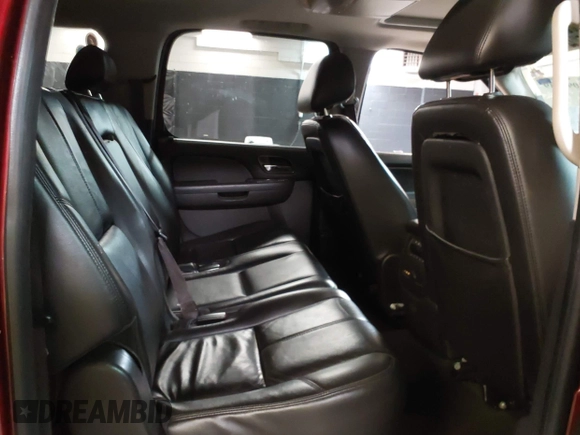 2010 Chevrolet Suburban LT z VIN 1GNUKJE32AR106197, wystawiony jako IAAI lot #42378134 z przebiegiem 106 479 mil mil oraz . Historia ofert i sprzedaży dostępna na DreamBid. Obrazek 8.