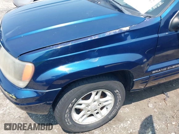 2002 Jeep Grand Cherokee Laredo with VIN 1J8GW48SX2C270339, listed as a IAAI auction lot 42390842 with Not provided miles and . Bid and sale history available at DreamBid. Image 17.