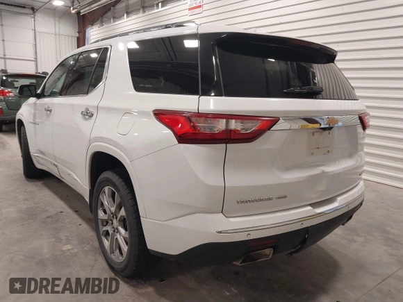 2021 Chevrolet Traverse Premier with VIN 1GNEVKKW7MJ218772, listed as a IAAI auction lot 42306743 with 106,898 mi miles and . Bid and sale history available at DreamBid. Image 3.
