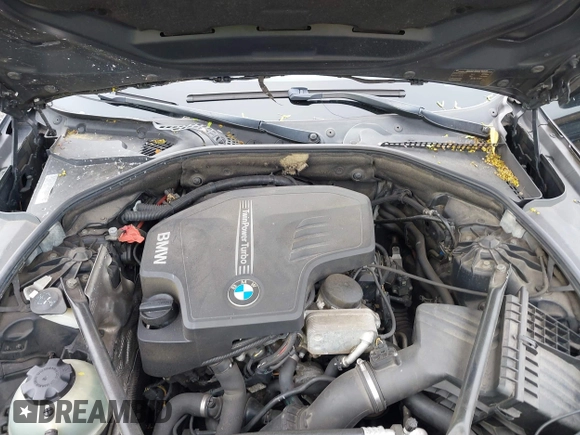 2014 BMW 5 Series 528i xDrive with VIN WBA5A7C54ED613352, listed as a IAAI auction lot 42197717 with 205,889 mi miles and . Bid and sale history available at DreamBid. Image 10.