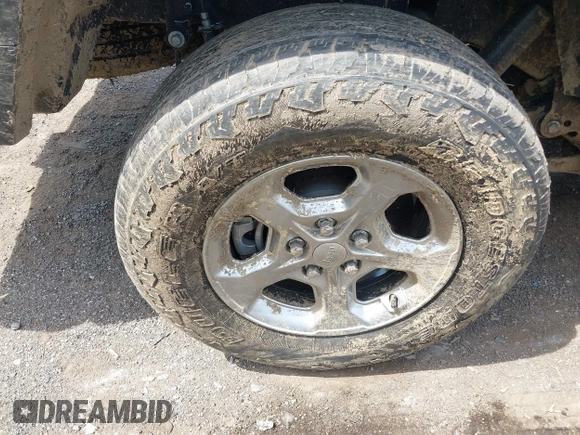 2021 Jeep Gladiator Freedom with VIN 1C6HJTAG3ML557932, listed as a IAAI auction lot 42150245 with 26,656 mi miles and . Bid and sale history available at DreamBid. Image 12.