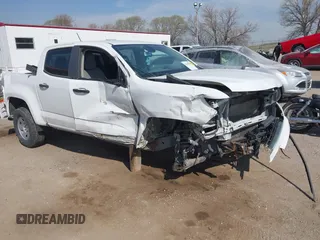 2019 Chevrolet Colorado 2WD Work Truck with VIN 1GCGSBEA7K1302243, listed as a IAAI auction lot 42049966 with 104,209 mi miles and . Bid and sale history available at DreamBid. Image 1.