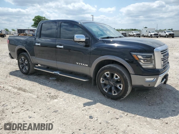 2023 Nissan Titan Platinum Reserve with VIN 1N6AA1EDXPN106467, listed as a Copart auction lot 53455215 with 56,061 mi miles and Salvage title. Bid and sale history available at DreamBid. Image 4.