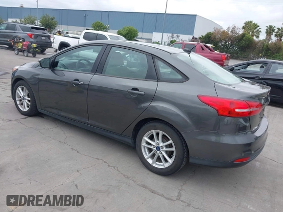 2015 Ford Focus SE with VIN 1FADP3F29FL342311, listed as a IAAI auction lot 42109683 with 70,579 mi miles. Bid and sale history available at carsss.com. Image 3.