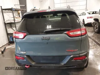 2015 Jeep Cherokee Trailhawk with VIN 1C4PJMBB4FW528633, listed as a IAAI auction lot 42147632 with 166,669 mi miles and . Bid and sale history available at DreamBid. Image 16.