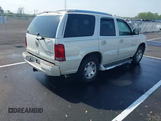 2005 Cadillac Escalade z VIN 1GYEC63T55R114823, wystawiony jako IAAI lot #41931065 z przebiegiem Nie podano mil oraz . Historia ofert i sprzedaży dostępna na DreamBid. Obrazek 4.