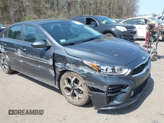 2019 Kia Forte LXS z VIN 3KPF24AD4KE081480, wystawiony jako IAAI lot #42073063 z przebiegiem 100 605 mil mil oraz . Historia ofert i sprzedaży dostępna na DreamBid. Obrazek 1.