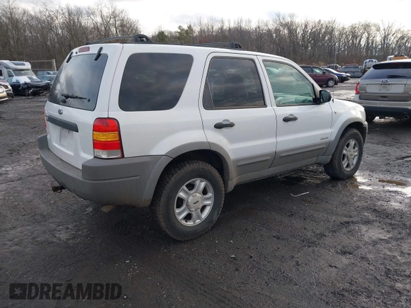 2002 Ford Escape XLT Choice with VIN 1FMYU04142KD82594, listed as a IAAI auction lot 41574646 with 173,174 mi miles. Bid and sale history available at carsss.com. Image 4.