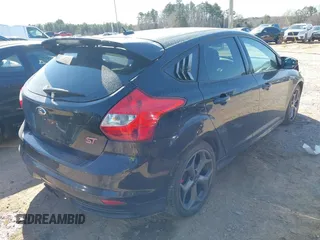 2014 Ford Focus ST with VIN 1FADP3L99EL191826, listed as a IAAI auction lot 41526553 with 131,131 mi miles and . Bid and sale history available at carsss.com. Image 4.