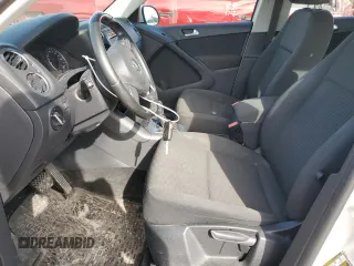 2013 Volkswagen Tiguan S z VIN WVGAV3AX2DW613867, wystawiony jako Copart lot #43034845 z przebiegiem 119 636 mil mil oraz Szkoda całkowita • Salvage title. Historia ofert i sprzedaży dostępna na DreamBid. Obrazek 7.