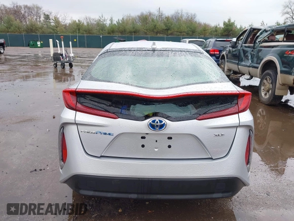 2021 Toyota Prius LE with VIN JTDKAMFP9M3170928, listed as a IAAI auction lot 42123934 with 58,293 mi miles and . Bid and sale history available at DreamBid. Image 17.