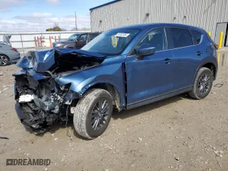 2021 Mazda CX-5 Touring with VIN JM3KFBCM5M0382279, listed as a Copart auction lot 51243185 with 46,982 mi miles and Salvage Title. Bid and sale history available at carsss.com. Image 1.