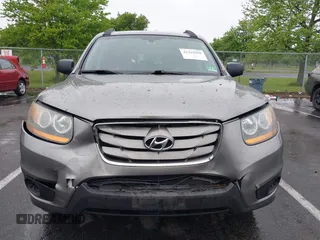 2011 Hyundai Santa Fe GLS z VIN 5XYZGDAB1BG027604, wystawiony jako IAAI lot #42219358 z przebiegiem 145 948 mil mil oraz . Historia ofert i sprzedaży dostępna na DreamBid. Obrazek 6.