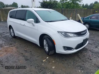 2018 Chrysler Pacifica Touring Plus z VIN 2C4RC1FG3JR102912, wystawiony jako IAAI lot #42240609 z przebiegiem 72 329 mil mil oraz . Historia ofert i sprzedaży dostępna na DreamBid. Obrazek 1.