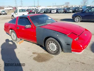 1987 Nissan 300ZX z VIN JN1HZ14S8HX202276, wystawiony jako IAAI lot #41797004 z przebiegiem 126 719 mil mil oraz . Historia ofert i sprzedaży dostępna na DreamBid. Obrazek 1.