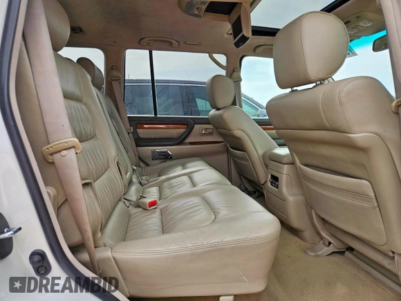 2004 Lexus LX 470 z VIN JTJHT00W743542910, wystawiony jako Copart lot #57187445 z przebiegiem 236 985 mil mil oraz Szkoda całkowita • Salvage title. Historia ofert i sprzedaży dostępna na DreamBid. Obrazek 11.
