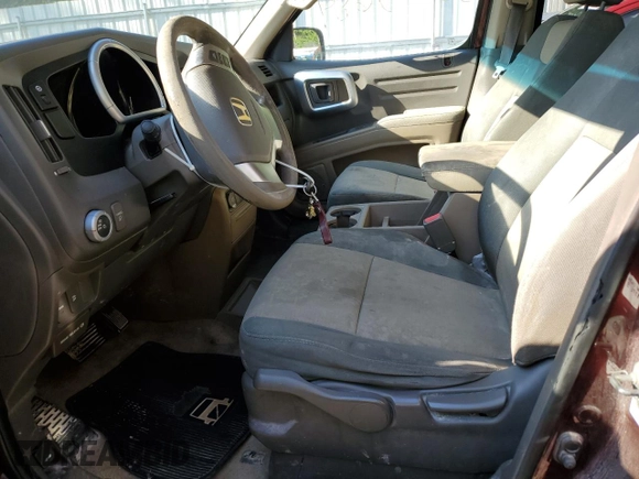 2007 Honda Ridgeline RT with VIN 2HJYK16297H551976, listed as a Copart auction lot 66175684 with 299,500 mi miles and Salvage Title. Bid and sale history available at carsss.com. Image 7.