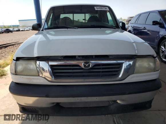 2000 Mazda B-Series Truck SE z VIN 4F4YR16C6YTM11839, wystawiony jako Copart lot #64460754 z przebiegiem 245 958 mil mil oraz Szkoda całkowita • Salvage title. Historia ofert i sprzedaży dostępna na DreamBid. Obrazek 5.